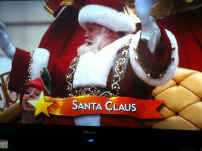 Fun, Santa claus, Interaction, Headgear, Costume accessory, Facial hair, Fictional character, Holiday, Costume hat, Tradition, 