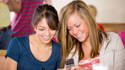 Smile, Jewellery, Happy, Facial expression, Tooth, Necklace, Friendship, Mobile phone, Blond, Layered hair, 