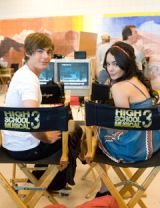 vanessa hudgens and zac efron in black chairs