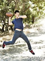 taylor lautner throwing a football