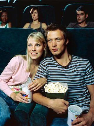 boy and girl in movie theater