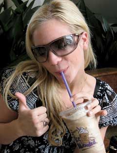 brittany snow drinking a coffee drink