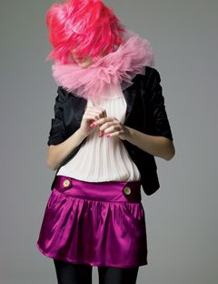 girl in hot pink wig and a purple skirt