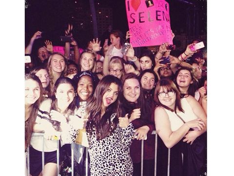 selena gomez poses for pics with fans