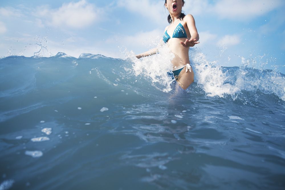 Wet Female Swimsuit Bra or Brassiere Floating in Water of Swimming