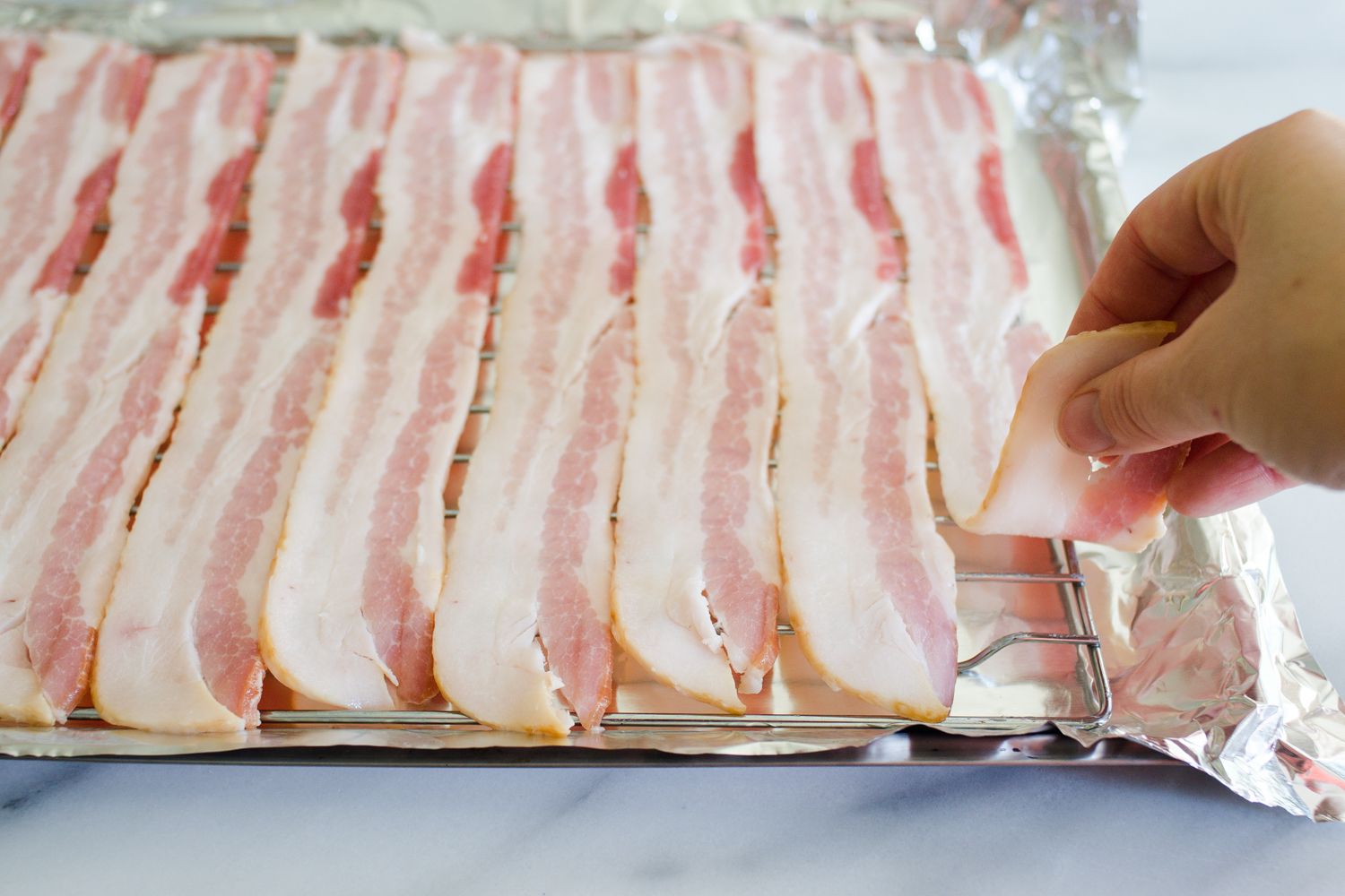 BACON TIP! 🥓 Cooking bacon in the oven on a sheet tray with parchment, Cooking  Bacon