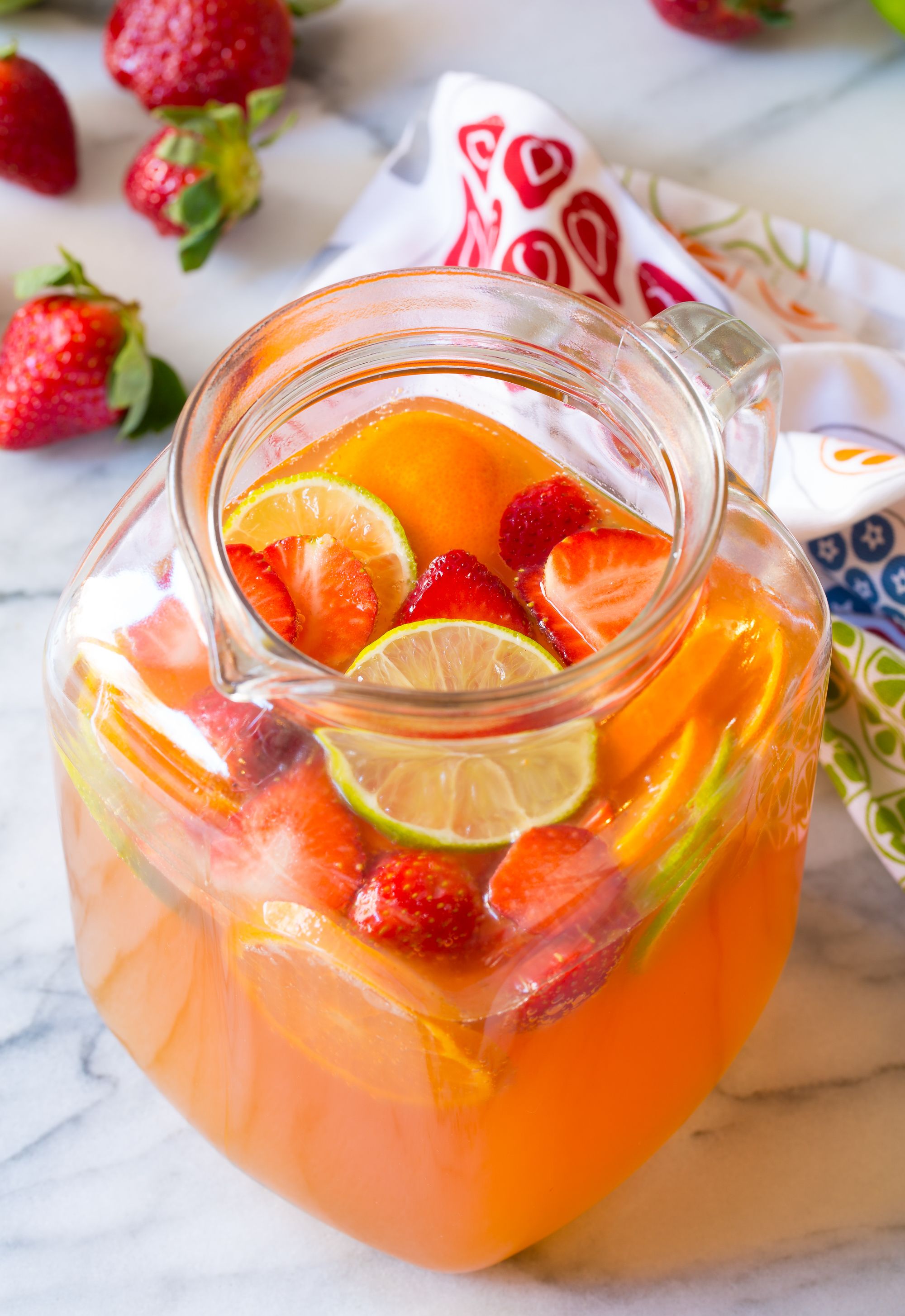 Pool party with sangria pitcher, fruit cocktails and refreshments