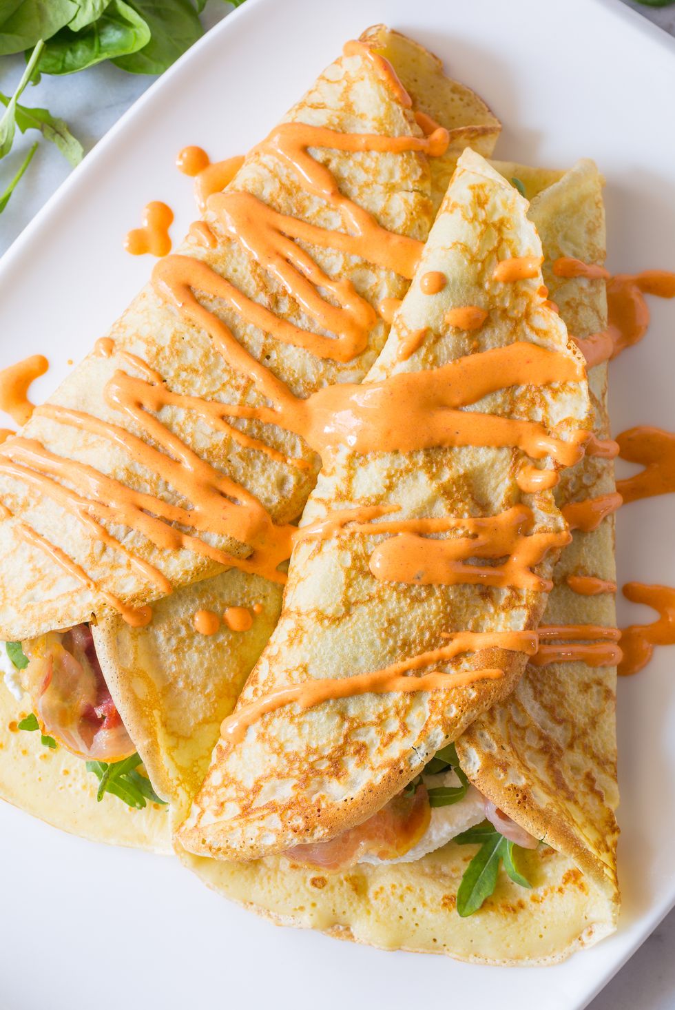 Pancetta Ricotta Crepes with Red Pepper Cream