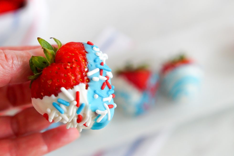 Red, White and Blue Strawberries hand