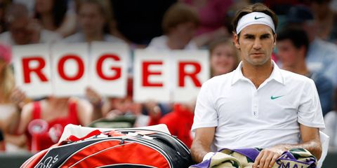 Roger Federer wins Wimbledon for the seventh time and reclaims his no. 1 ranking.