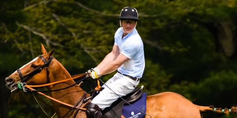 "I'm hoping for a soft pitch so when I fall off my horse I won't hurt my head," Prince Harry confessed to Town & Country Editor in Chief Jay Fielden. Nevertheless, he nobly took the field with the Sentebale Land Rover team he captained this Tuesday at the Greenwich Polo Club, on the final day of his visit to the United States. And the Prince, a second lieutenant in the British Army and third in line for the British throne, showed no signs of rust, scoring the final and decisive goal for his Blues against a St Regis Hotel team led by the Argentinean polo professional Nacho Figeuras.The four-chukker exhibition polo match, sponsored by Royal Salute, Land Rover, the St. Regis Hotel group and Town & Country, raised more than a million dollars for the Sentebale charity that Prince Harry founded with Prince Seeiso of Lesotho. The event drew a glittering crowd eager to support the Princes and their cause (all proceeds from the event go to support the neediest children of Lesotho). Stephanie Seymour, the wife of Peter Brant, who owns the Greenwich Polo Club that hosted the event, sat to the right of Prince Harry at a lunch preceding the four-chukker match. The model Karolina Kurkova filled the empty seat on the Prince's other side.