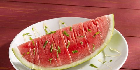 Ingredients:    •    1 cup(s) (from 6 to 7 limes) fresh lime juice    •    1/4 cup(s) honey    •    1 (about 12 pounds) ripe watermelon, chilled, quartered lengthwise, and cut into thick slicesDirections    1.  In 2-quart saucepan, heat lime juice and honey to boiling on high, stirring occasionally. Boil 2 minutes. Remove from heat. Transfer to small bowl and refrigerate until cold. Syrup can be refrigerated up to 1 day ahead.    2. Place watermelon slices on large platter. Drizzle with lime syrup and serve immediately.via Delish.com