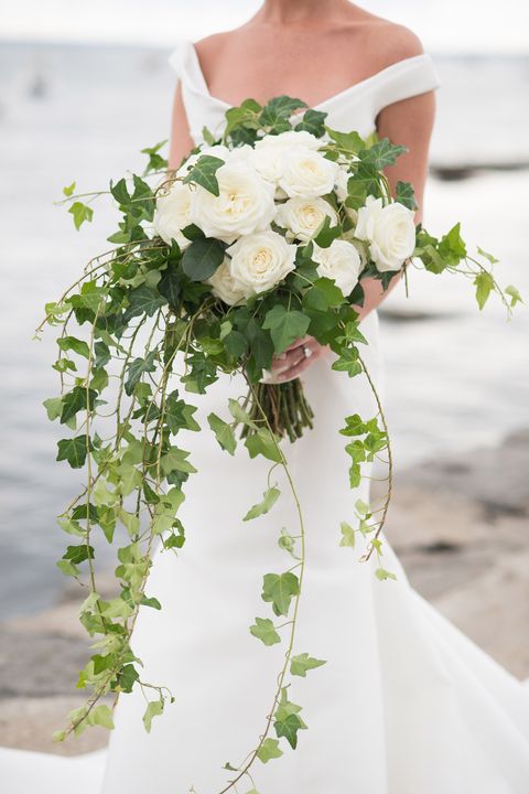 Petal, Flower, Dress, Bouquet, Wedding dress, Cut flowers, Bridal clothing, Flowering plant, Bride, Strapless dress, 