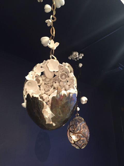 Whimsical hanging lamps made of bronze, porcelain, and crystal. Whimsical hanging lamps made of bronze, porcelain, and crystal.