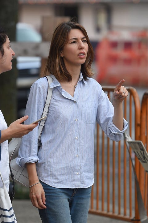 wearing button down shirt open