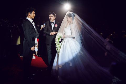 Coat, Trousers, Bridal veil, Dress, Bridal clothing, Veil, Outerwear, Suit, Formal wear, Wedding dress, 