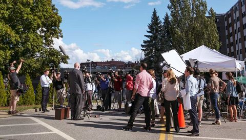 Footwear, Public space, Tree, Jeans, Crowd, Tent, Pedestrian, Pole, Canopy, Tar, 