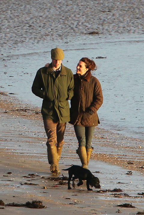 Prince William and Duchess Catherine beach with Lupo in Anglesey, Wales