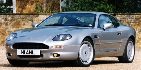 <p>The British carmaker kept up appearances with this c<a href="http://www.caranddriver.com/comparisons/aston-martin-db7-vantage-vs-porsche-911-turbo-ferrari-360-modena-f1-comparison-tests">lassically proportioned coupe</a>.</p>