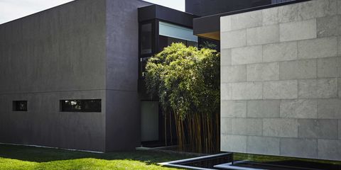 Grass, Green, Property, Architecture, Wall, Concrete, Rectangle, Composite material, Shade, Lawn, 