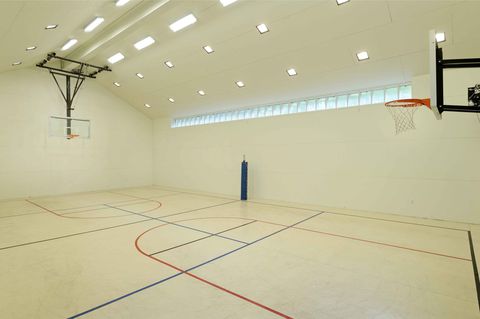 Basketball hoop, Sport venue, Basketball court, Floor, Field house, Line, Basketball, Ceiling, Net, Light fixture, 
