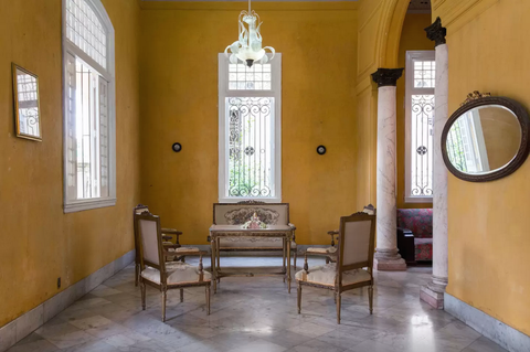 The living room of a colonial house in the Vedado neighborhood of Havana.
