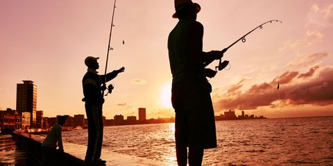 Human, Recreation, Fishing rod, Standing, Fisherman, Outdoor recreation, Horizon, People in nature, Fishing, Recreational fishing, 
