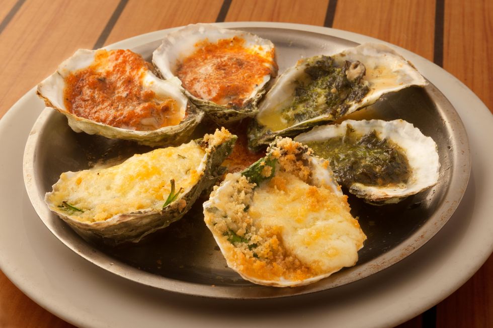 Dish, Food, Cuisine, Oysters rockefeller, Oyster, Stuffed clam, Ingredient, Seafood, Produce, Baked goods, 