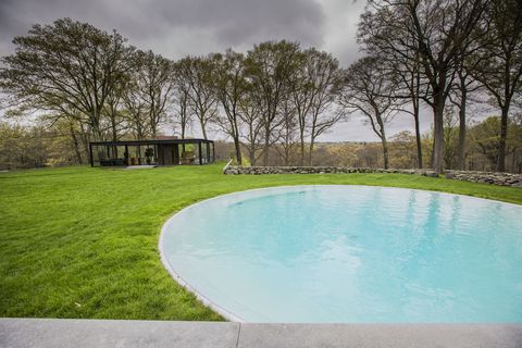 Swimming pool, Property, Fluid, Tree, Real estate, Aqua, Composite material, Garden, Rectangle, Lawn, 
