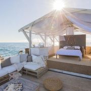 Bed, Couch, Sun, Ocean, Shade, Sunlight, Sea, Bed frame, Living room, Home, 