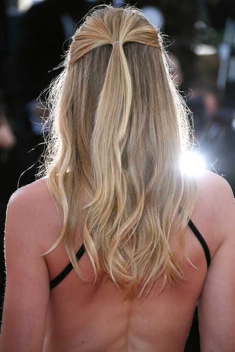 CANNES, FRANCE - MAY 11:  Model Doutzen Kroes (hair detail) attends the "Cafe Society" premiere and the Opening Night Gala during the 69th annual Cannes Film Festival at the Palais des Festivals on May 11, 2016 in Cannes, France.  (Photo by Venturelli/WireImage)