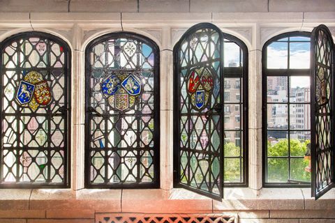 Glass, Stained glass, Fixture, Art, Arch, Iron, Building material, Daylighting, Window film, Holy places, 