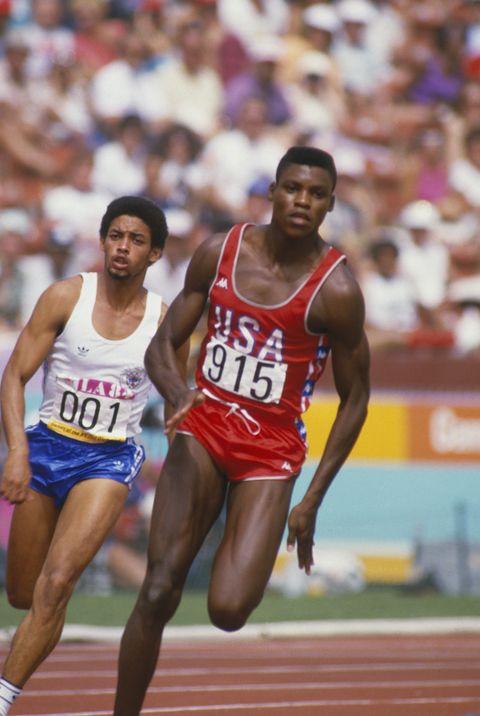 1984: Carl Lewis runs on the track during the Summer Olympics XXIII circa 1984 in Los Angeles, California.