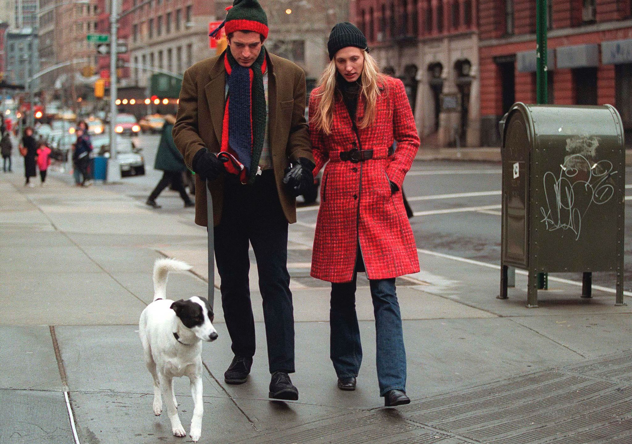 John F. Kennedy Jr. and his wife Carolyn walk with their dog January 1, 1997 in New York City. July 16, 2000 marks the one-year anniversary of the plane crash off the coast of Martha's Vineyard in Massachusetts that killed John F. Kennedy Jr., 38, his wife Carolyn Bessette Kennedy, 33, and her sister Lauren Bessette, 34. (Photo by Evan Agostini/Liaison