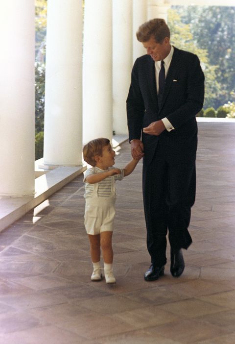 October 1963  President Kennedy and his son, John F. Kennedy Jr. White House, West Wing Colonnade. Photograph by Cecil Stoughton, White House, in the John F. Kennedy Presidential Library and Museum, Boston.