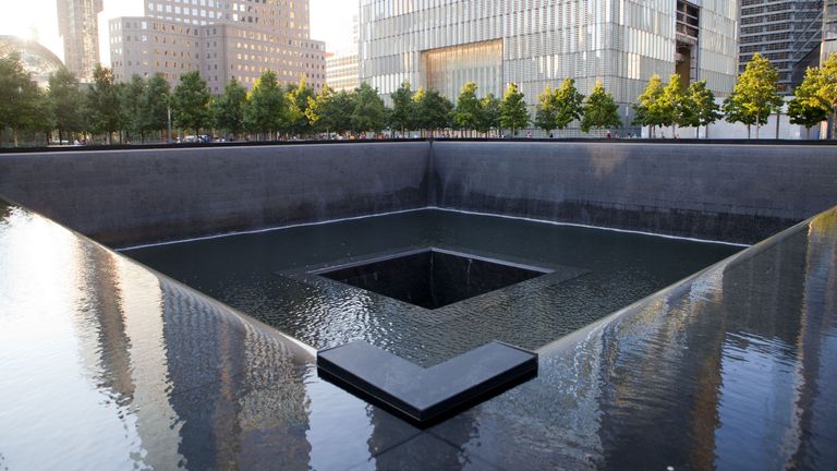Reflecting pool, Water, Architecture, Memorial, Reflection, Pond, Building, Condominium, Water feature, Urban design, 
