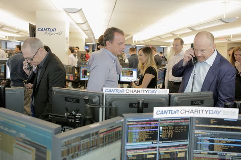 Louis C.K. and Steve Buscemi making trades at Charity Day.