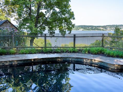 Reflection, Home fencing, Fence, Pond, Garden, Reflecting pool, Landscaping, Yard, 