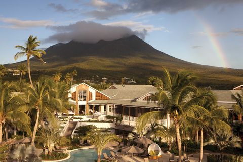 <p>A tropical getaway in the heart of the West Indies, the Four Seasons Nevis is almost unimaginably romantic, remote, and luxurious, with amenities including five restaurants, the Library Bar cocktail and cigar lounge, three infinity-edge pools, tennis, a golf course, a destination spa, and an herb garden. The 196 rooms and suites offer breathtaking ocean views, and there are also two cottages and 50 private residence villas and rentals available. Guests can catch and then eat their dinner, thanks to the resort's Dive and Dine scuba experience.</p><p><i data-redactor-tag="i">Rates from $398 per night, <a href="http://Fourseasons.com/nevis" target="_blank" data-tracking-id="recirc-text-link">fourseasons.com</a></i></p><p><i data-redactor-tag="i"><a href="http://Fourseasons.com/nevis" target="_blank" data-tracking-id="recirc-text-link"></a></i><i data-redactor-tag="i">Pinney's Beach, Charlestown, St. Kitts &amp; Nevis</i></p>