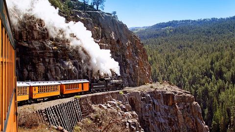 Mountainous landforms, Transport, Railway, Rolling stock, Locomotive, Highland, Train, Railroad car, Geological phenomenon, Valley, 