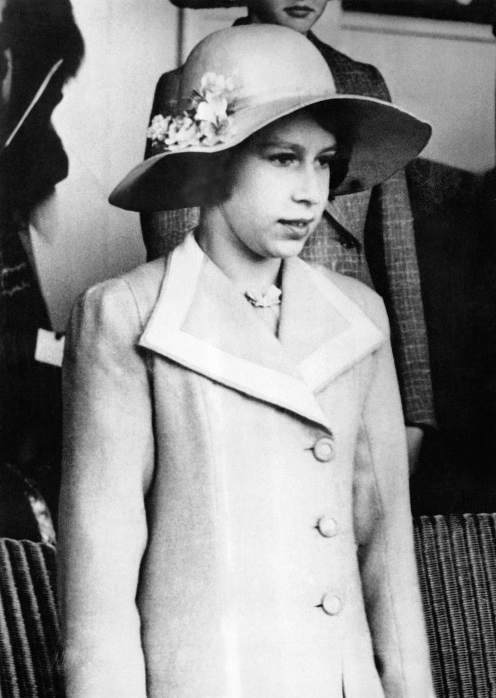 Hat, Collar, Sleeve, Coat, Style, Headgear, Blazer, Fashion, Vintage clothing, Sun hat, 
