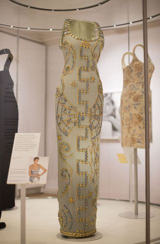Dress, Fashion, Collection, One-piece garment, Fashion design, Visual arts, Day dress, Mannequin, Pattern, Museum, 