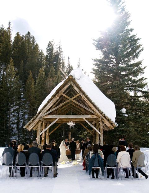 This bare-bones spa resort, a former ghost town near Telluride, is a great venue for a rustic gathering.THE CEREMONY: Up to 60 guests can be seated on the outdoor benches and chairs. Pendleton blankets are supplied if the weather gets chilly.THE RECEPTION: Typically held in town at the hotel-owned Saloon and Dance Hall.THE ACCOMMODATIONS: Stay at the Well House, the only cabin with a private hot springs soaking tub.THE FINE PRINT: Dunton Hot Springs has no vendor restrictions. Brides have booked two years in advance for a buyout, which allows 44 guests to stay overnight.THE PERKS: Colorado lets just about anyone marry you with the right license.THE DOWNTIME: A restorative dip in the springs, of course.FUN FACT: During summer, some bridal parties pick flowers in the meadows instead of hiring a florist.Pictured: A couple get married in a snow-covered chapel in Colorado's San Juan Mountains.duntonhotsprings.com