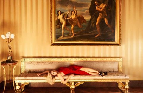 Pepi Marchetti Franchi, director of the Gagosian Gallery in Rome, takes her rightful place among the artworks at the Palazzo Torlonia.Max Mara Elegante silk dress ($1,250).