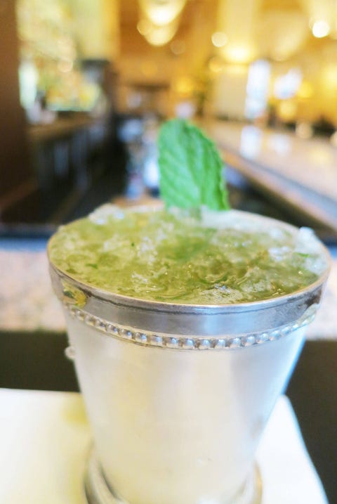 Mint Julep This recipe for the classic drink comes from Gotham Bar and Grill in New York City: 3 Sprigs Mint2 oz Black Maple Hill Bourbon.5 oz Simple SyrupCrushed IceIn a julep cup (or a highball glass) muddle 2 sprigs of mint with the simple syrup. Fill cup 3/4 full with crushed ice. Add bourbon. Stir. Fill remaining glass with crushed ice and a sprig of mint.