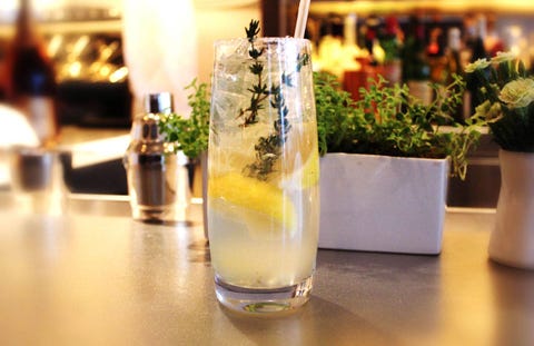 Jean-Georges' hard lemonade. This refreshing spiked lemonade comes from Chef Jean-Georges Vongerichten. 3 lemon wedges sugar .25 cup Lemon-Thyme Syrup.25 cup citrus vodka .25 cup club soda1 sprig fresh thyme, preferably lemon thymeRun 1 lemon wedge over the rim of a highball glass; dip the rim into sugar. Reserve the lemon wedge. Put the remaining 2 lemon wedges in a cocktail shaker along with the syrup and vodka. Muddle hard, breaking the lemon skins to release their oils. Cover and shake.Carefully fill the rimmed glass with ice. Pour the syrup mixture into the glass, lemon wedges and all. Top off with the club soda, the squeeze the reserved lemon wedge over before dropping it into the glass. Garnish with the thyme sprig and serve immediately.Lemon-Thyme SyrupMakes 1 cup.75 cup sugar1 small bunch fresh thyme, preferably lemon thyme (.5 ounce)In a small saucepan, heat 1 cup water and the sugar to boiling, stirring to dissolve the sugar. Add the thyme, remove from the heat, and let stand until cool. Strain through a fine-mesh sieve, pressing to extract as much liquid as possible. Cover and refrigerate for up to 3 days.