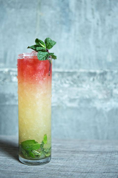 This delicious drink from Hinoki & the Bird in Los Angeles contains the winning combination of bourbon, absinthe, and mint. Here's how it's made:2 oz Bourbon 1 oz Fresh lime juice .75 oz simple syrup 2 dashes Absinthe 3 dashes each Angostura and Peychaud's bitters 1 sugar cube 5-6 Mint leaves 1 Mint sprigIn a small tin combine sugar cube, mint leaves, lime juice, simple syrup, bourbon and absinthe. Give the ingredients a slight muddle to awaken the mint; do not grind it. Take ingredients and dump into a Collins glass, fill about 3/4 full of crushed ice, add three dashes each of peychaud and angostura bitters, lightly swizzle bitters to have them "blend" into the drink. Top with more crushed ice and garnish with a mint sprig. 