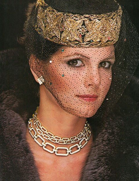 In Town & Country's December 1978 issue, we report on how to ring in the New Year with style in Newport. By channeling Deborah Stoddard Baldwin's look—David Webb earrings and necklaces, Halston for Ben Kahn fur, and Don Kline veil—we can create an equally alluring look for New Year's Eve 2013.