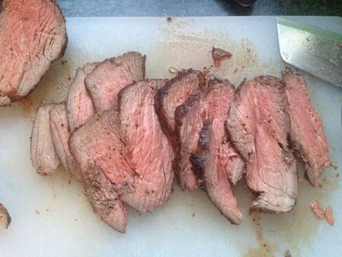 Flank steak is great for sandwiches, but high quality fillets of sirloin or prime rib will fill your buns with even more flavor. Season with salt and pepper, grill it up until it's medium rare, and carve into sandwich appropriate slices.