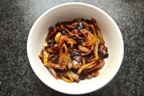Everything is better with caramelized onions. Butter, a pinch of sugar and a large yellow or white onion in skillet for about 40 minutes will produce warm, sweet candy-like onions. You want these to sweat over low heat for a while so they don't burn, so start cooking these before you cook your steak.